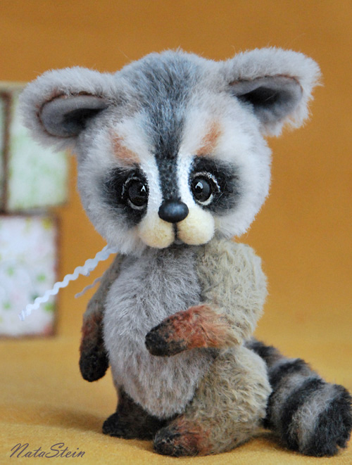 1372507044_raccoon-anatol1.jpg