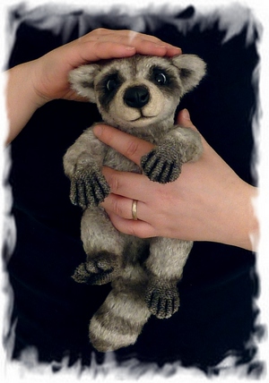 1365841951_baby_raccoon_tt2.jpg